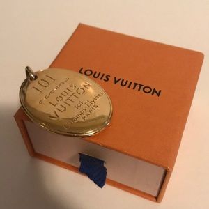 Louis Vuitton charm necklace without chain.